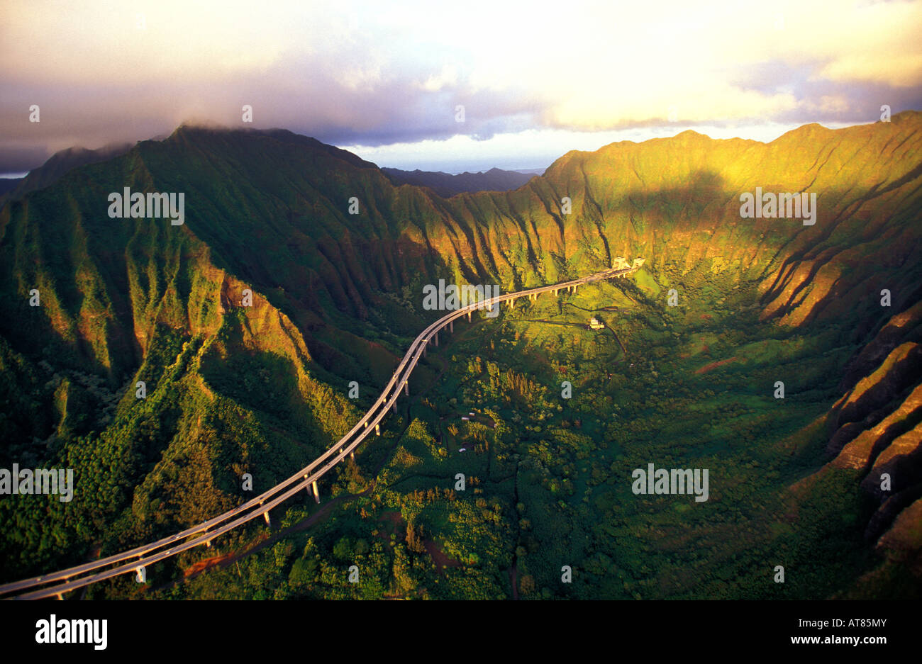 H-3 freeway as it winds through the Koolau mountains with early morning light on Oahu Stock Photo