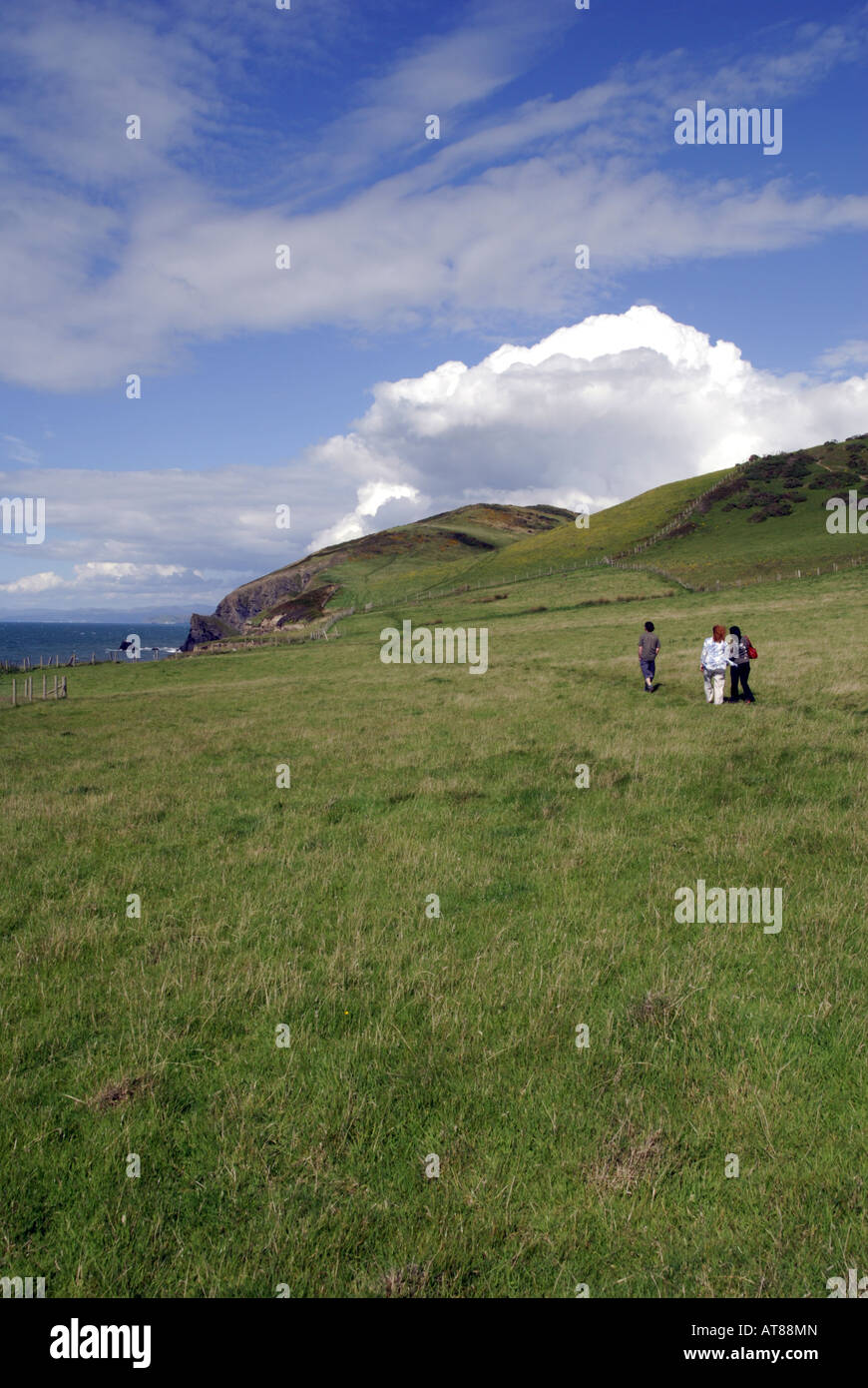 Walkers on the Ceredigion Coastal Path, nr Llanrhystud, Aberystwyth Stock Photo