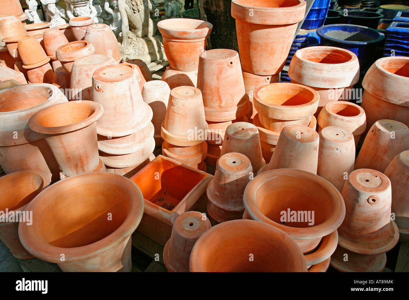 Display of terracotta pots for sale in garden center Stock Photo Alamy