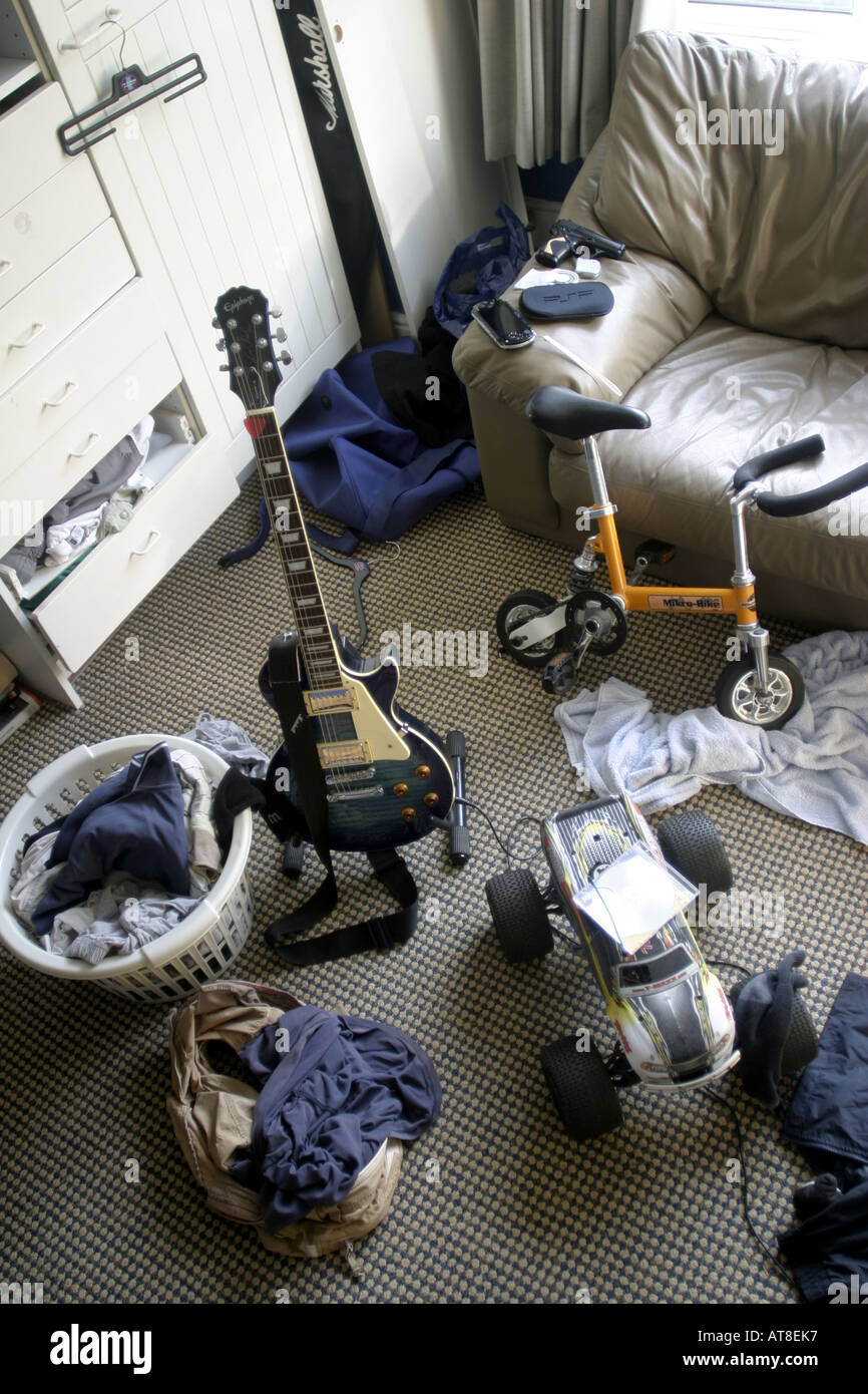 Messy male teenagers bedroom Stock Photo