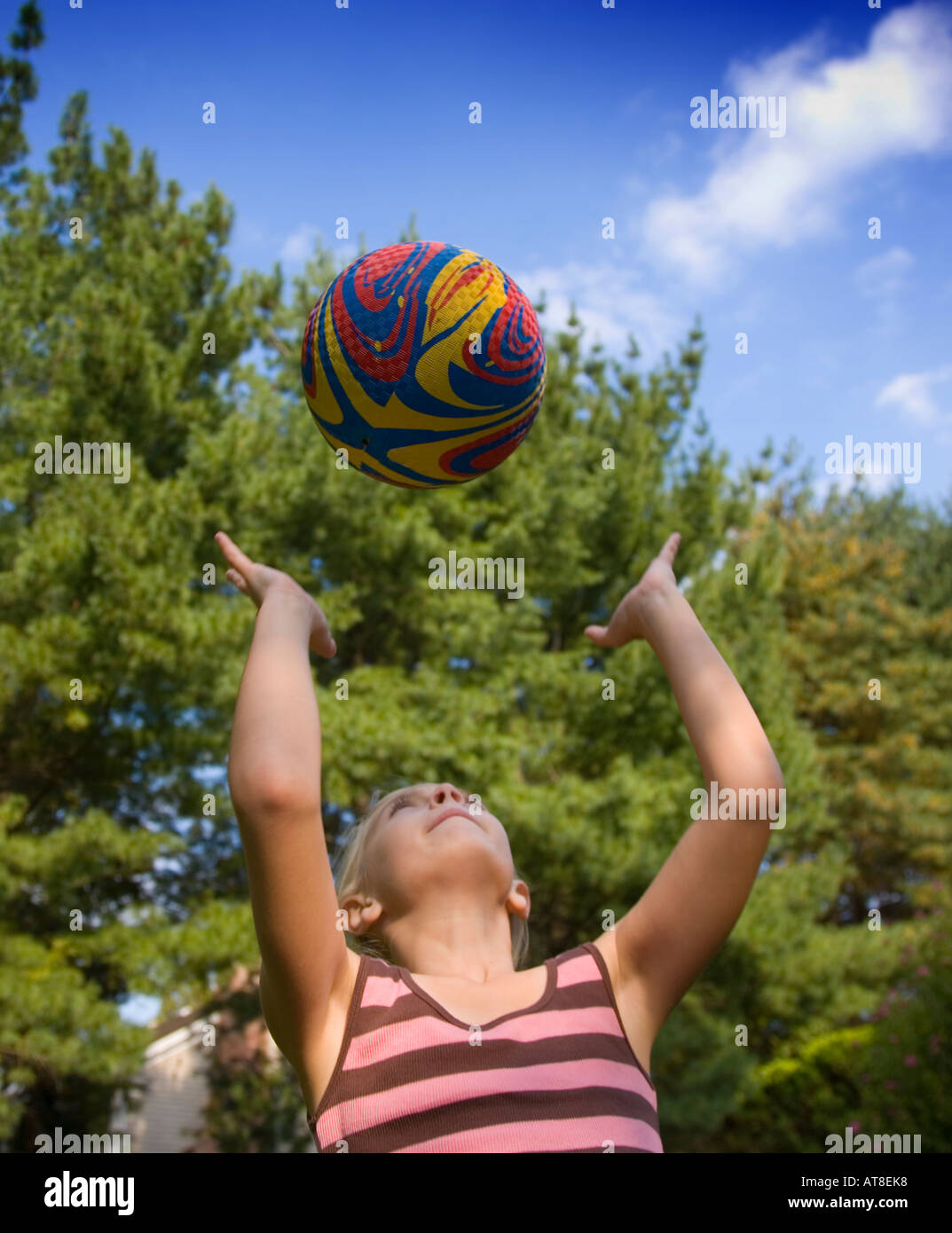 Child tossing ball air hires stock photography and images Alamy