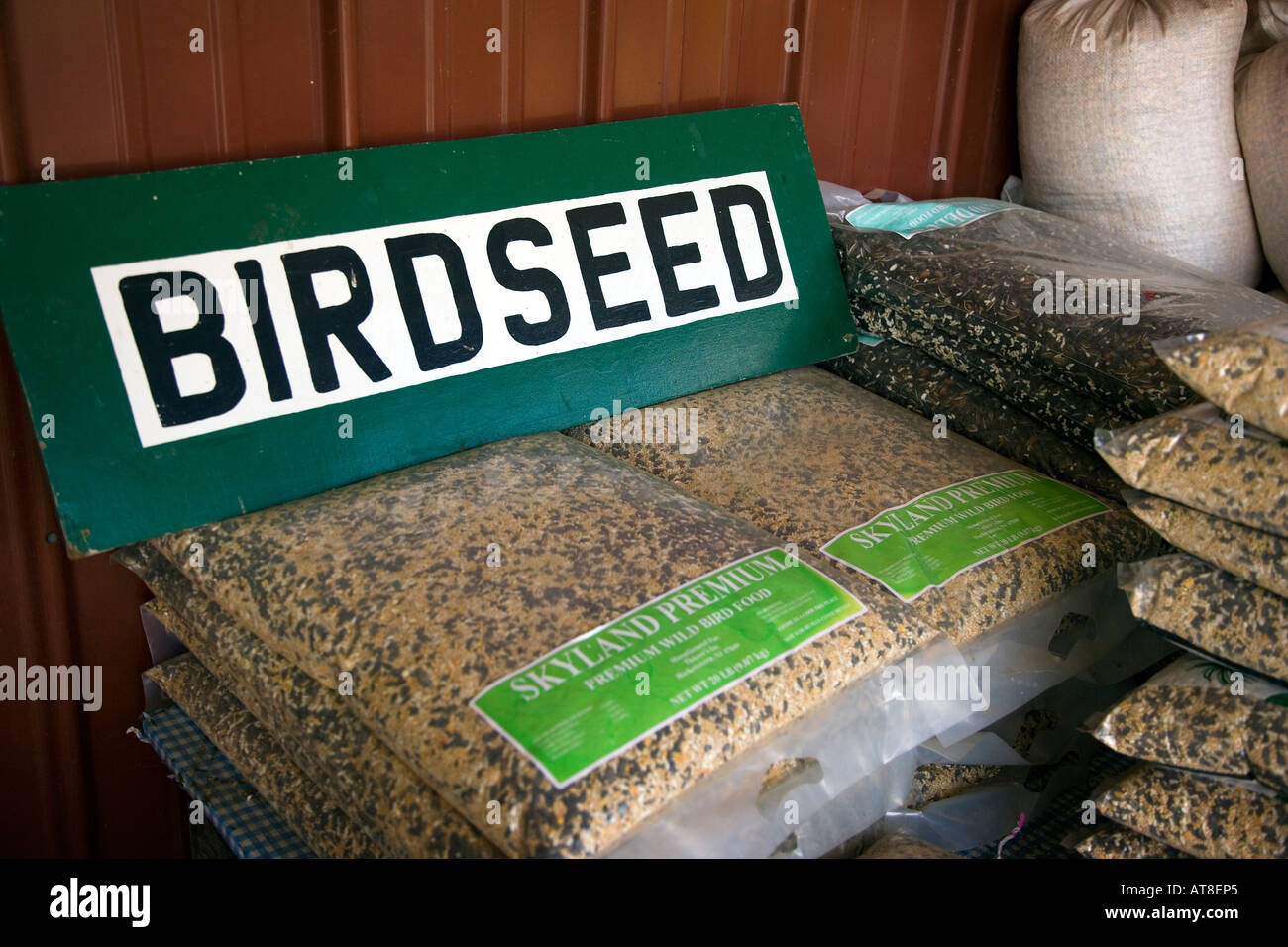 Birdseed for sale at a farm stand Stock Photo Alamy