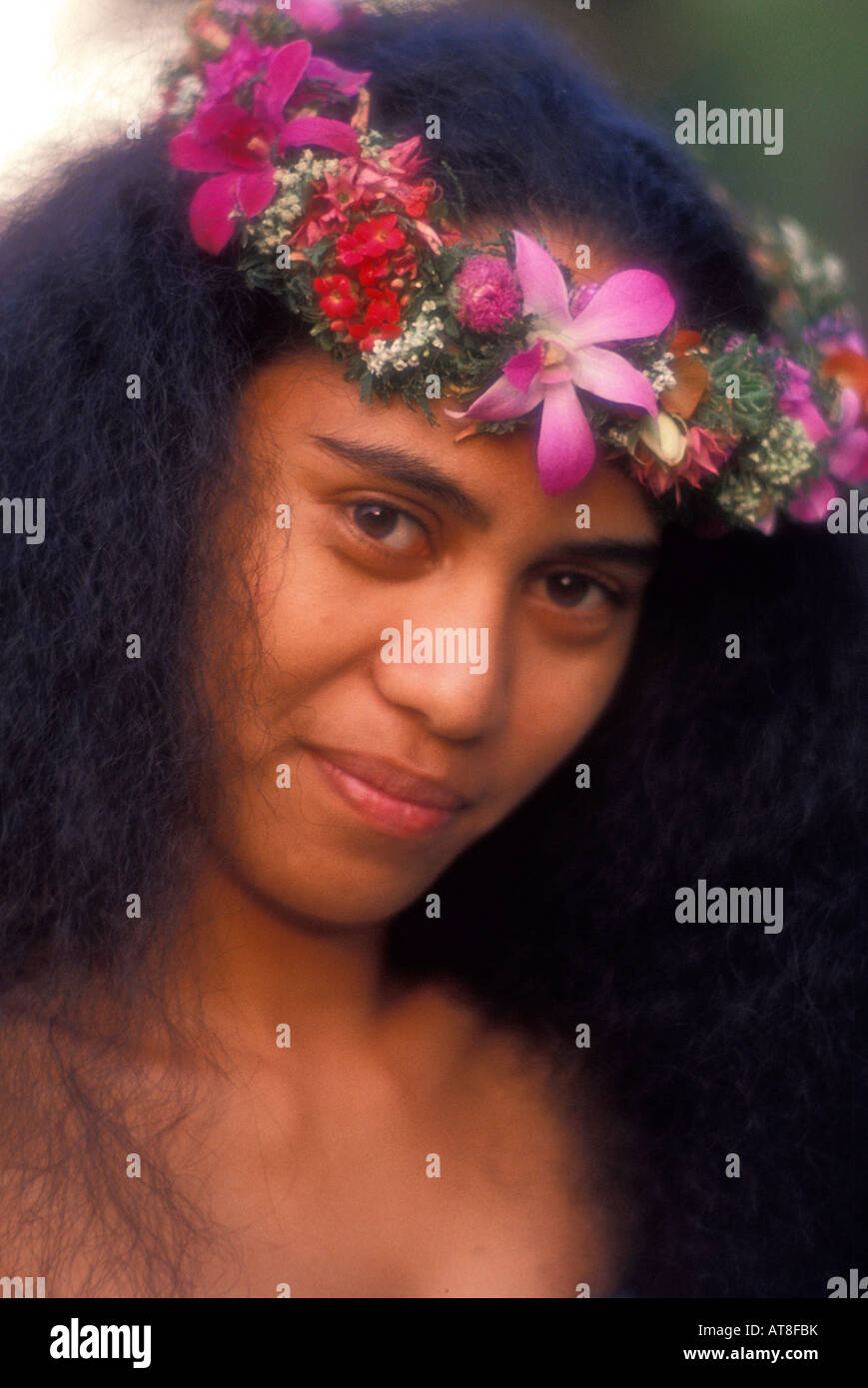 Polynesian woman wearing pink haku lei Stock Photo - Alamy