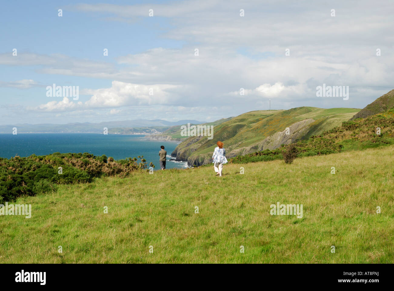 Walkers on the Ceredigion Coastal Path nr. Llanrhystud Stock Photo