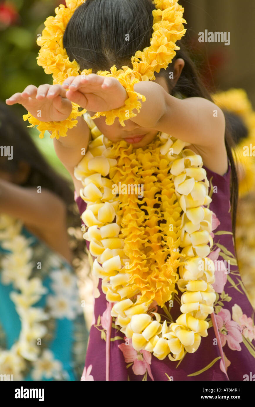 Hula dancers perform at Kapiolani park bandstand on May day, also known