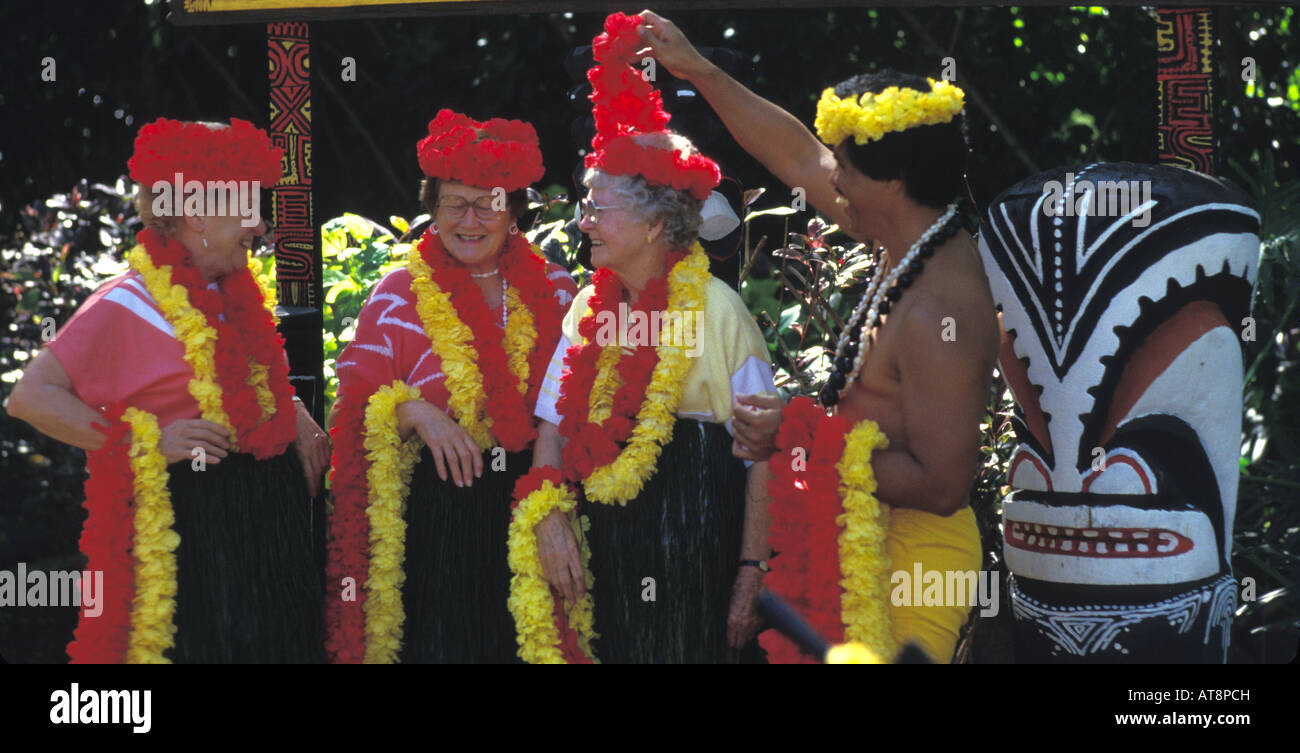 Three Senior women receiving lei greeting, Oahu Stock Photo Alamy