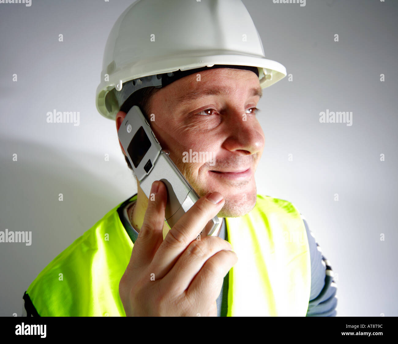 Construction worker on a mobile phone Stock Photo