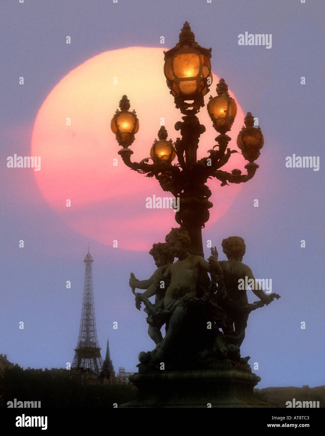 FR - PARIS:  Sun setting over Pont Alexandre III Stock Photo