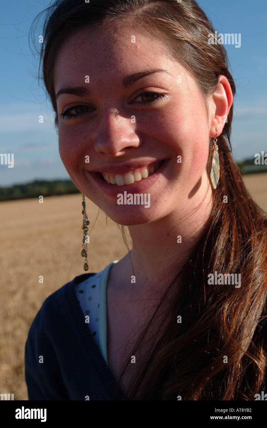 Portrait of a teenage girl smiling Stock Photo - Alamy