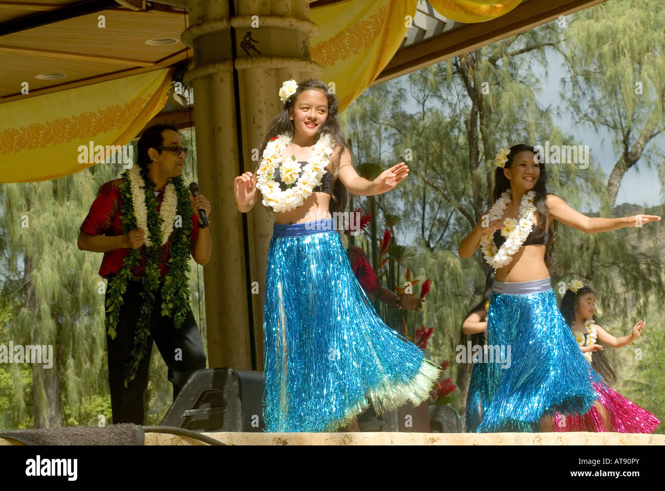 Hula dancers perform at Kapiolani park bandstand on May day, also known