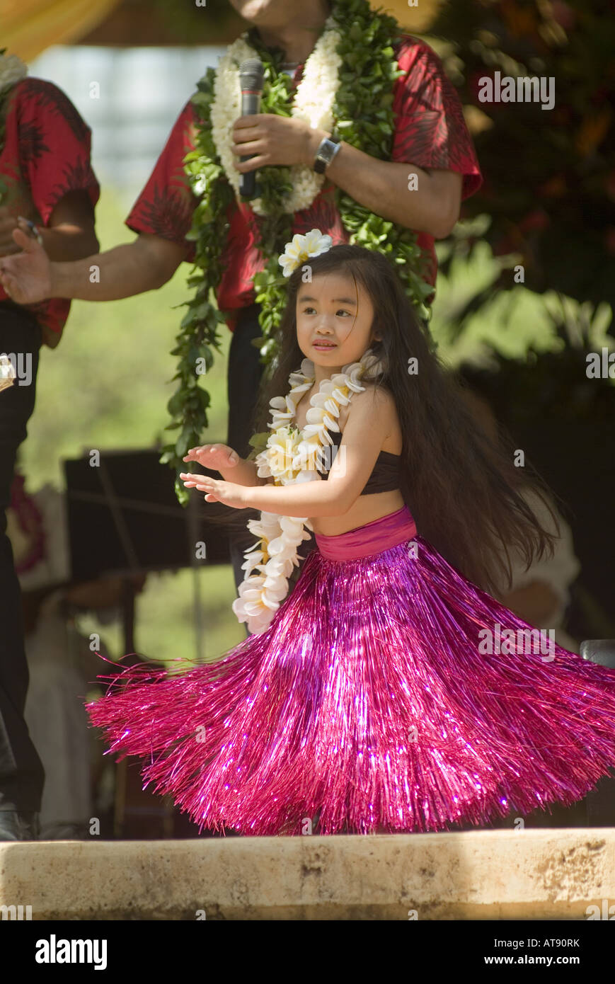 Hula dancers perform at Kapiolani park bandstand on May day, also known