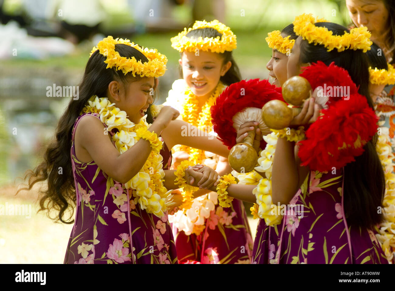 Hula dancers perform at Kapiolani park bandstand on May day, also known