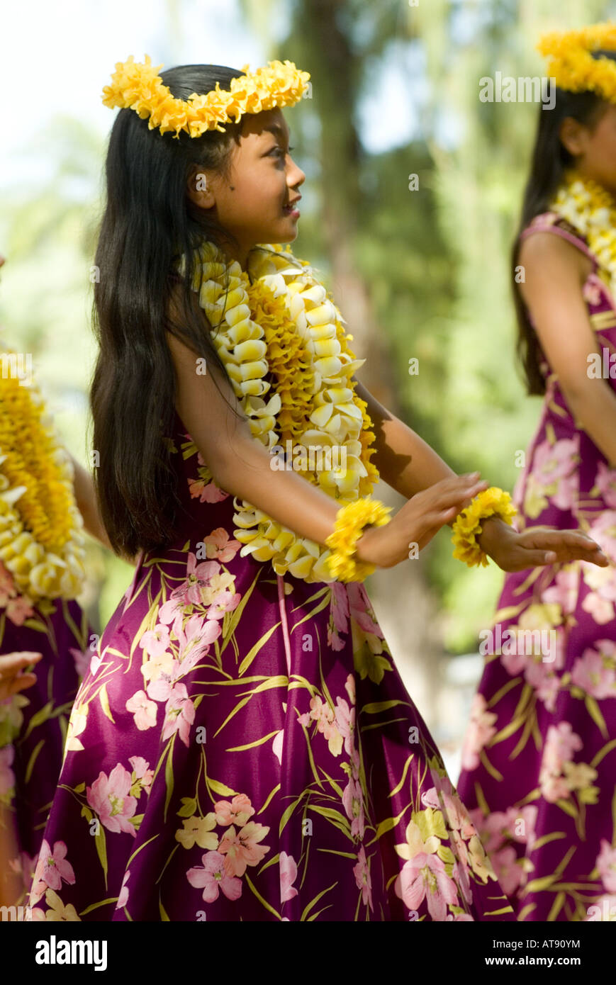 Hula dancers perform at Kapiolani park bandstand on May day, also known