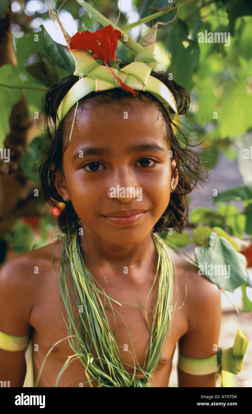 Young native girl wearing traditional ceremonial costume prepares for dance in Ma Village, Yap, Micronesia. Stock Photo