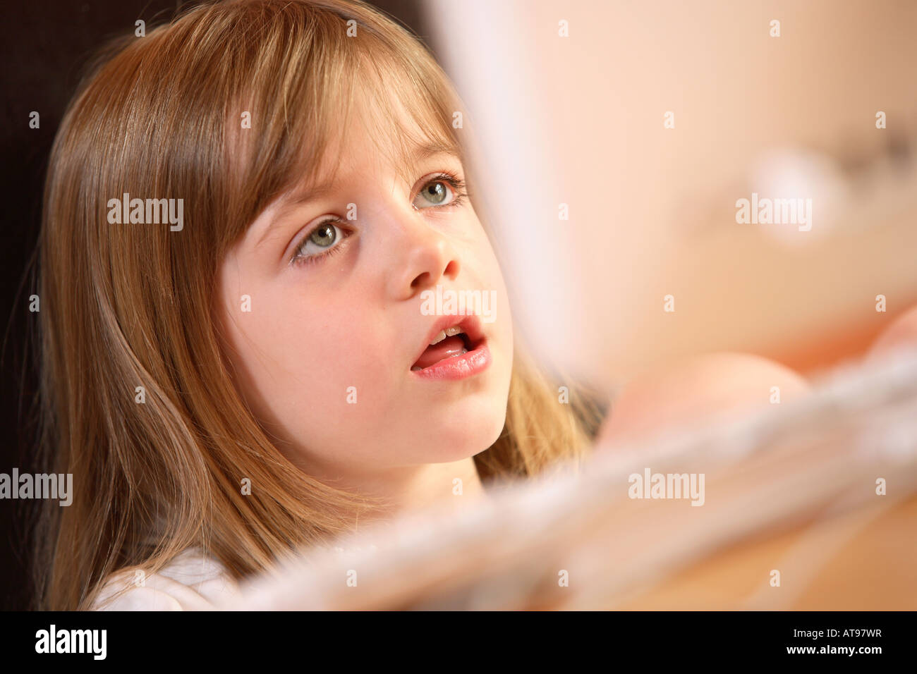 Close-up of a child working at a computer Stock Photo