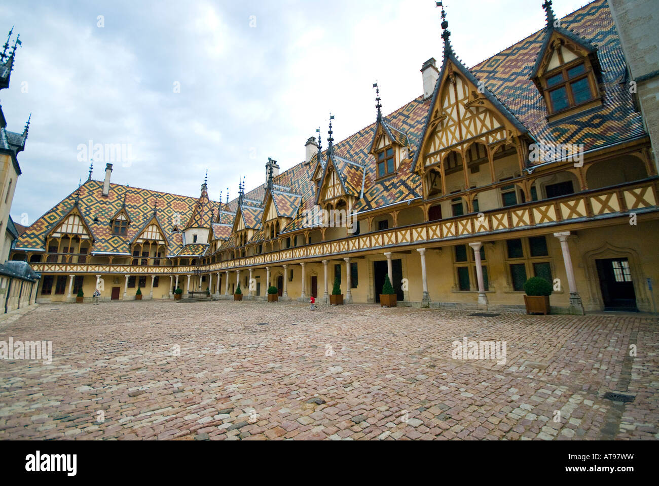 Courtyard of the Hotel Dieu, Hospices de Beune, in Bourgogne (Burgundy), France Stock Photo