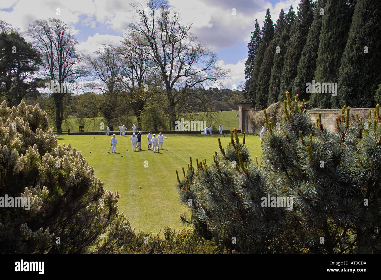 Croquet in Spring at the Belsay Croquet Club elegantly housed in the grounds of the Regency Belsay House Northumberland UK Stock Photo