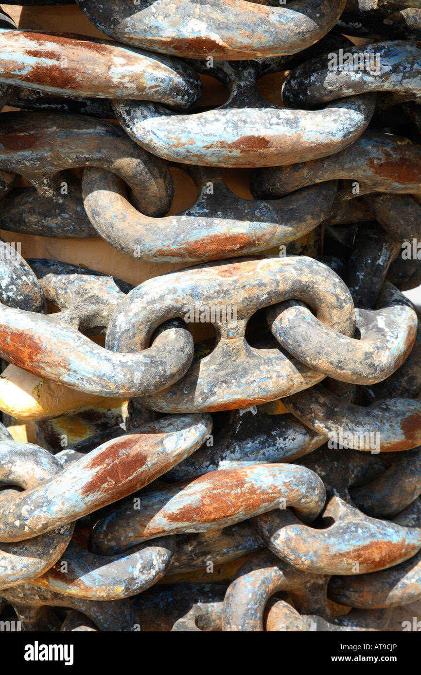 Close up of large metal chain links. Huge oval shaped metal links with two  separate holes. Gray with brown rusty patches Stock Photo - Alamy