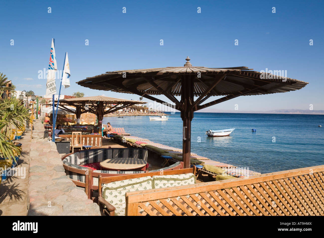 Dahab Sinai Peninsula Gulf of Aqaba Egypt Asia outdoor cafe and bay in seaside resort on Red Sea east coast Stock Photo
