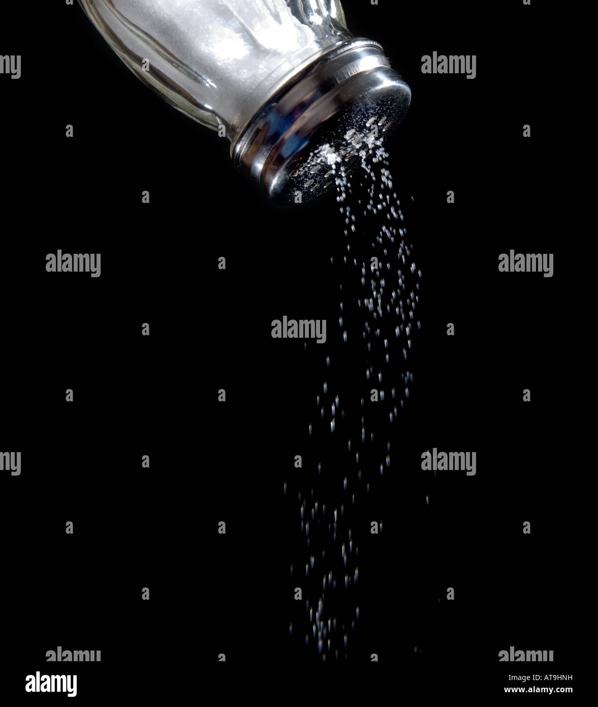 Salt shaker with salt coming out Salt shaker sodium salty falling out