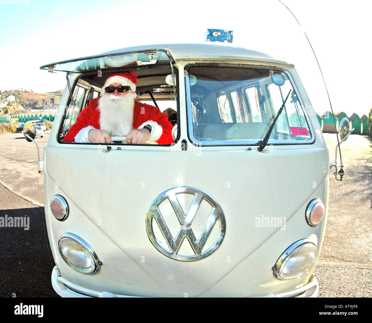 Father Christmas in VW camper van at Langland Bay, Swansea, Wales, UK Stock  Photo - Alamy