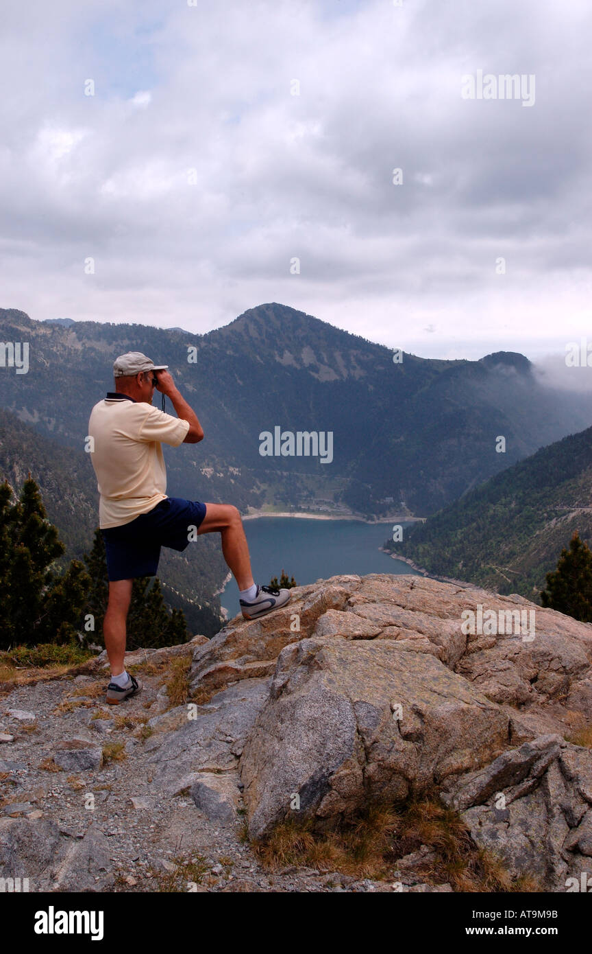 Taking in the view of  Lac d'Oredon in the French Pyrenees Stock Photo