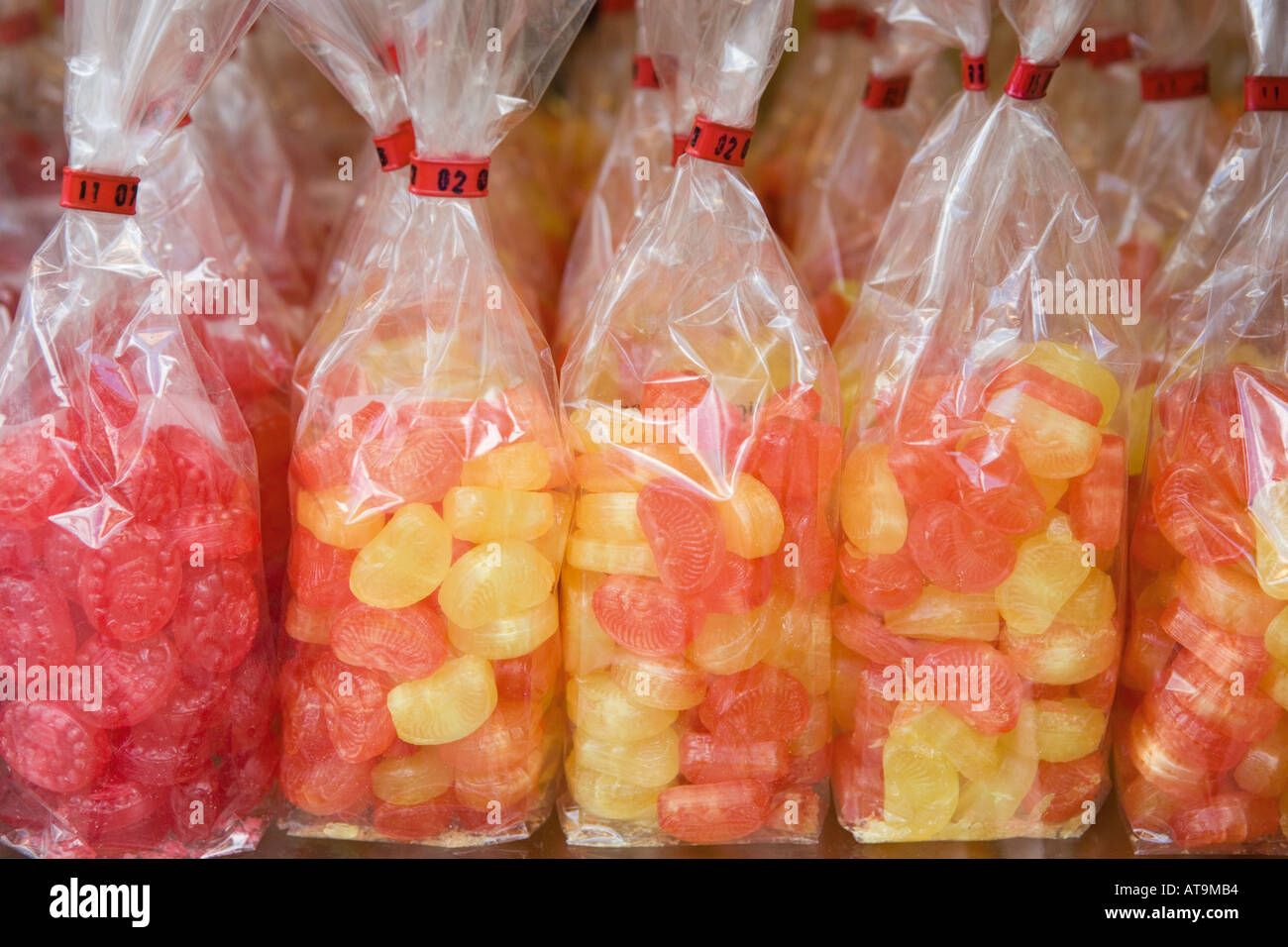 Cellophane bags of sweets Stock Photo - Alamy