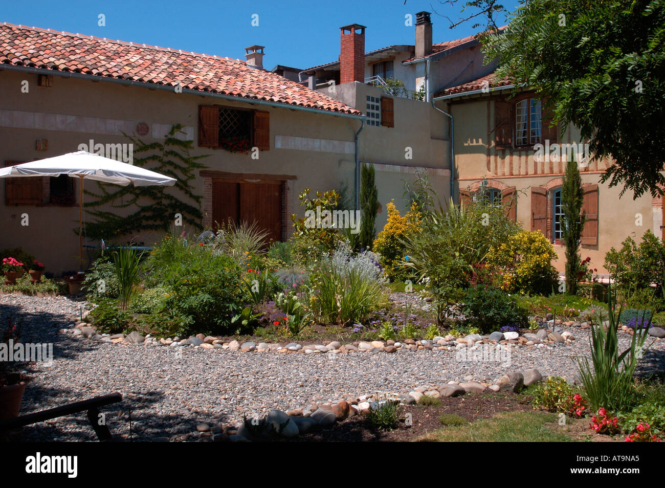 A private garden in a home and adjoining gite in the Haute Garonne region Stock Photo