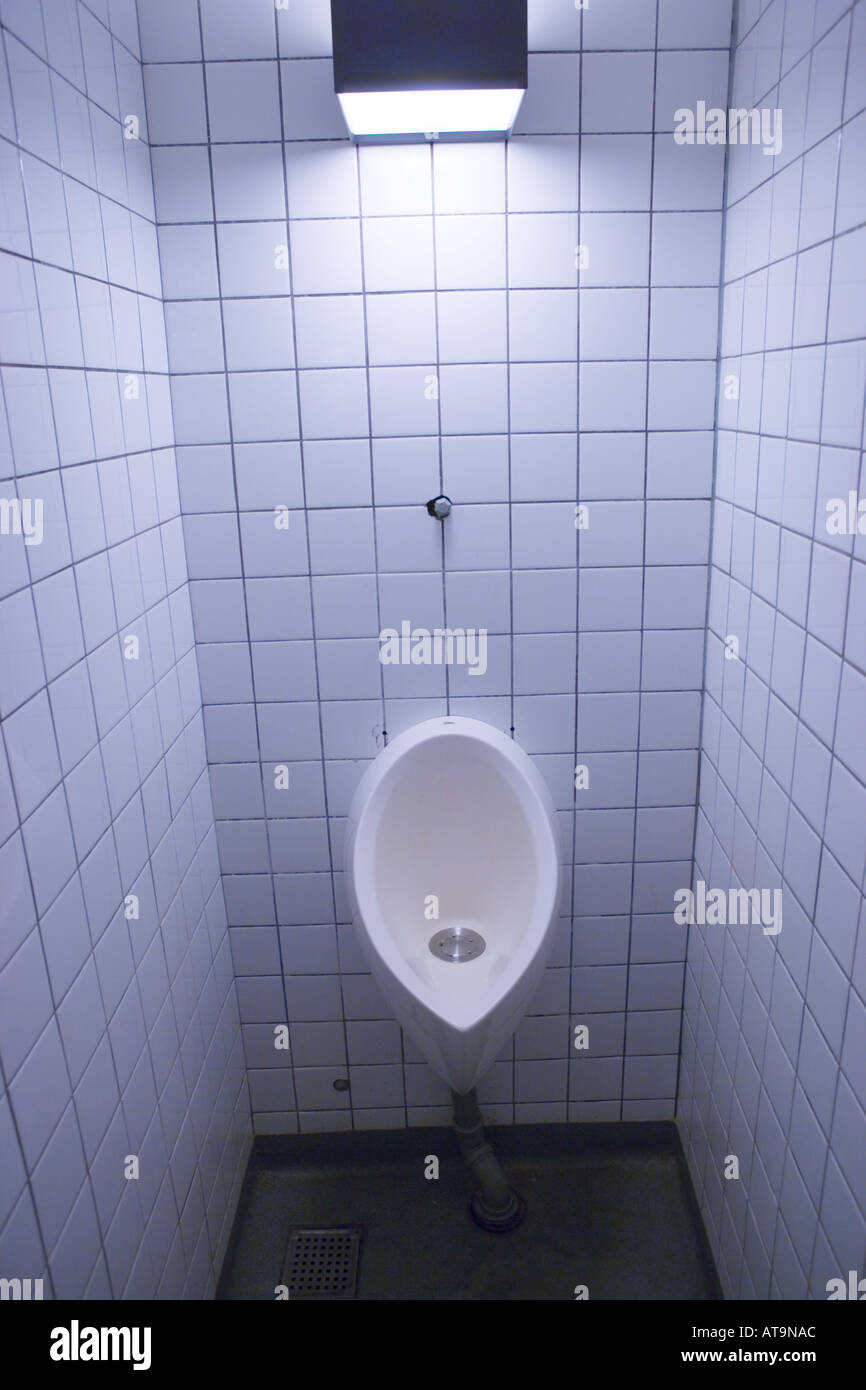 Urinal in mens toilet Stock Photo - Alamy
