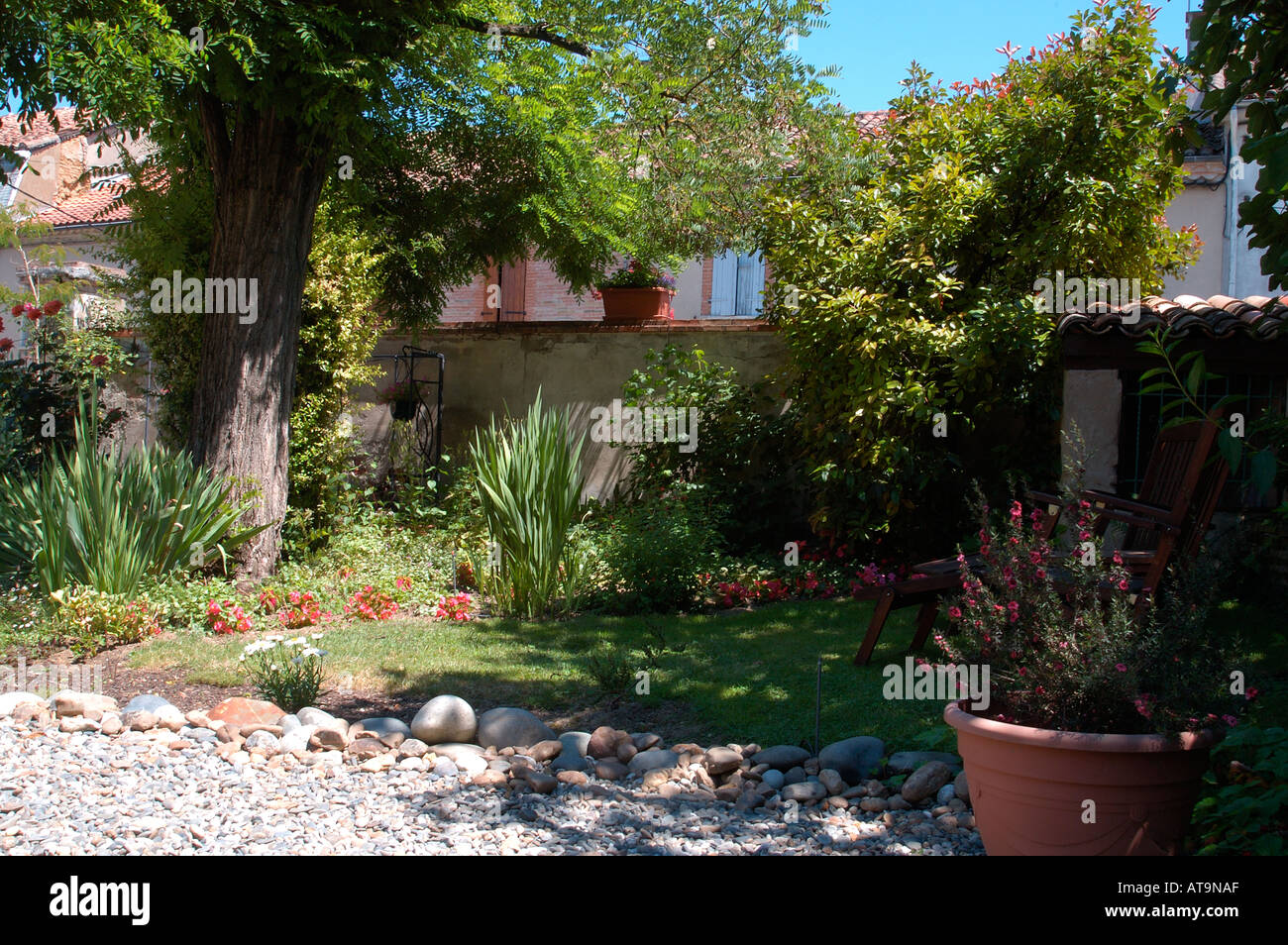 A private garden in a home and adjoining gite in the Haute Garonne region of France Stock Photo