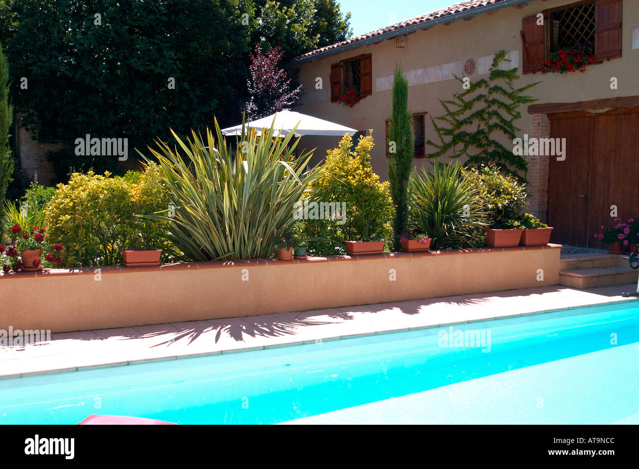 A private pool and garden in the Haute Garonne region of France Stock Photo