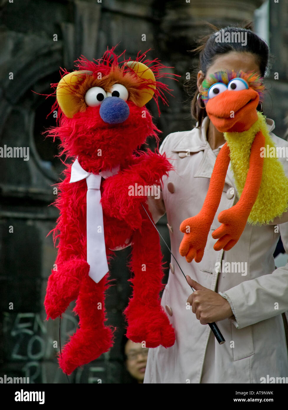 Two hand puppets looking towards viewer being held by female operator, Edinburgh Fringe Festival, Scotland, UK, Europe Stock Photo