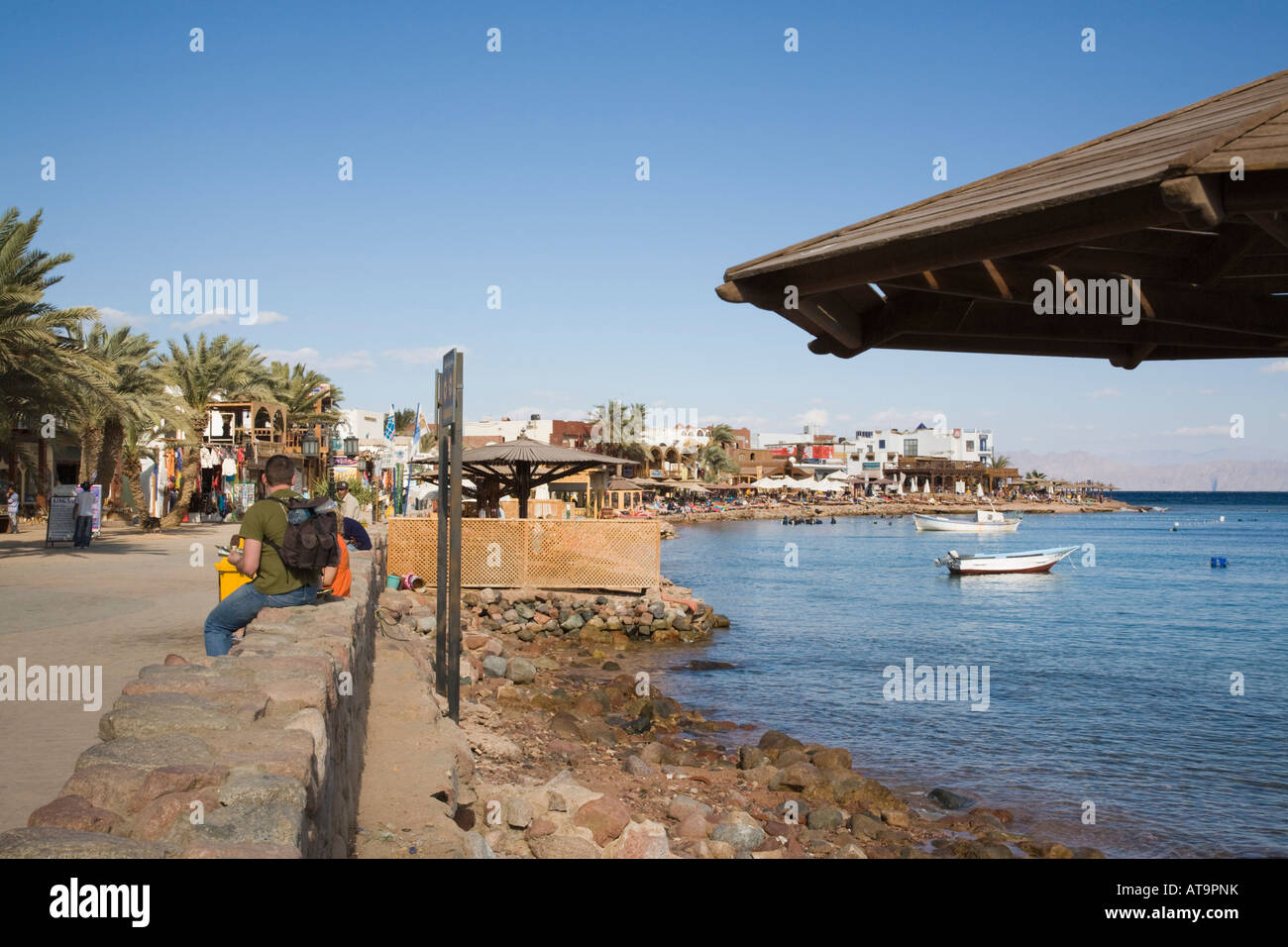 Dahab Sinai Peninsula Gulf of Aqaba Egypt Asia February Waterfront promenade and bay in seaside resort on Red Sea east coast Stock Photo