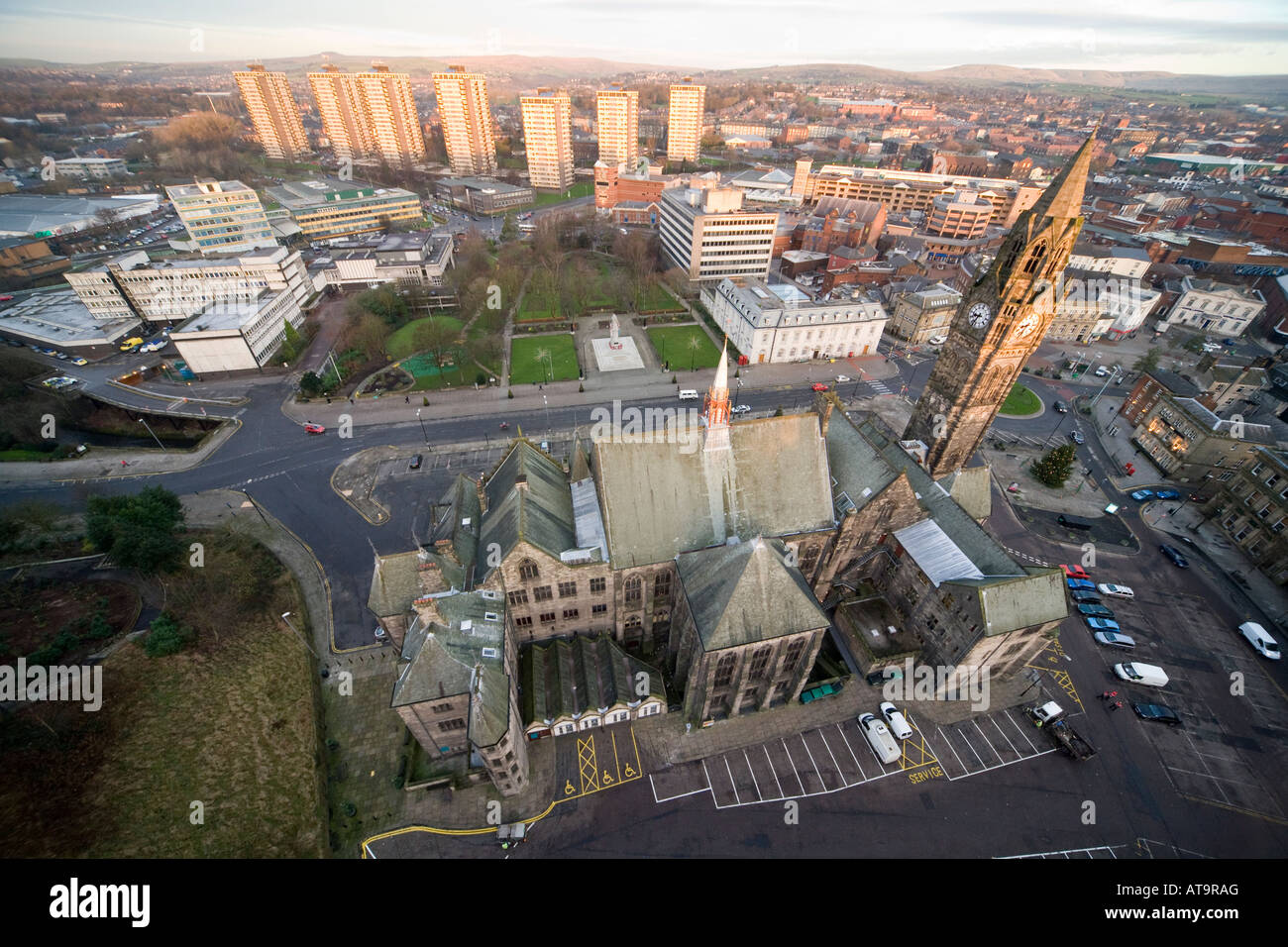 Imposing vertigo aerial shot from a cherry picker of Rochdale Town Hall and town centre Lancashire UK Stock Photo