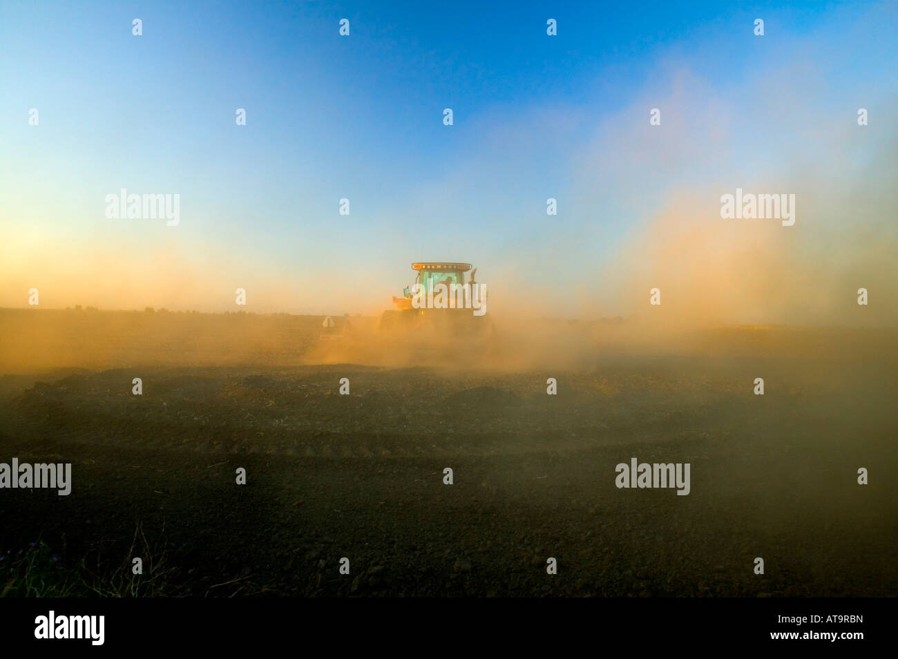 farm tractor dust Stock Photo Alamy