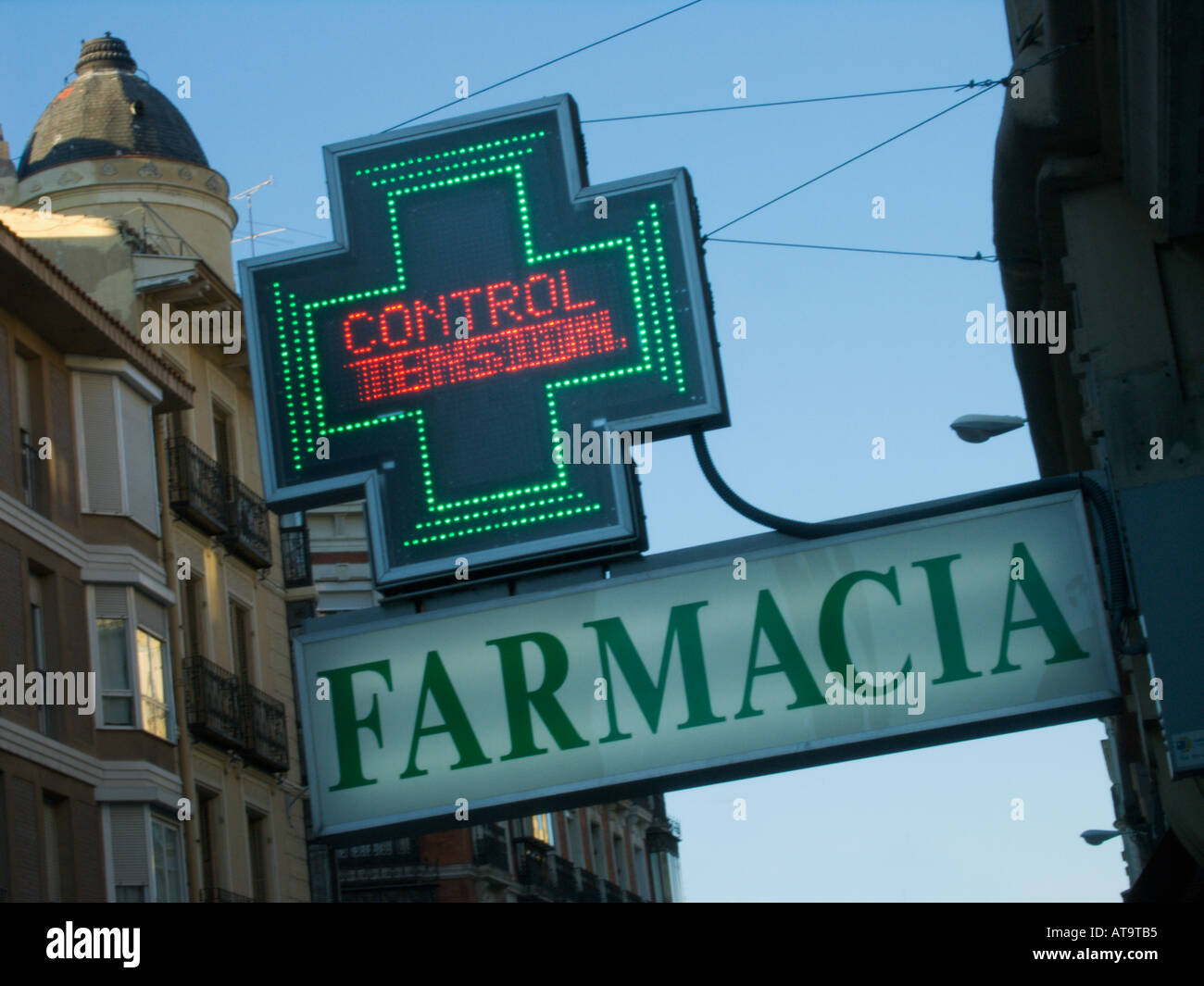 Madrid Spain capital city Neon Farmacia sign Control Tension Stock Photo