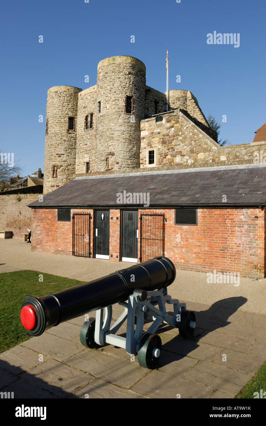 A canon in the canon garden in Rye, East Sussex with the Ypres tower in the background Stock Photo