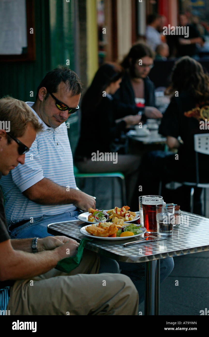 Two males prepare to eat a meal at High Street restaurant, Edinburgh Fringe Festival, Scotland, UK, Europe Stock Photo