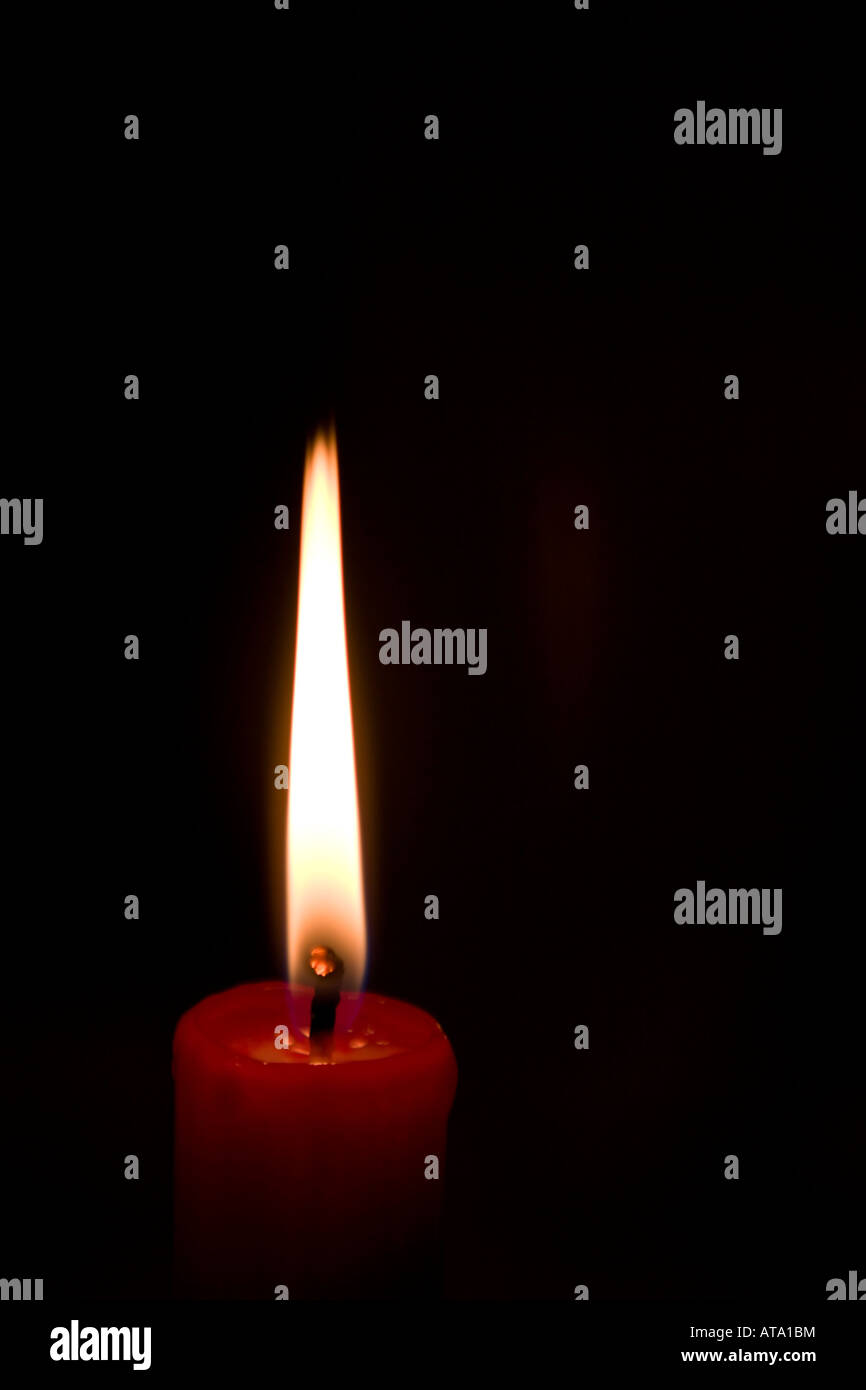 Candle in dark room Stock Photo Alamy