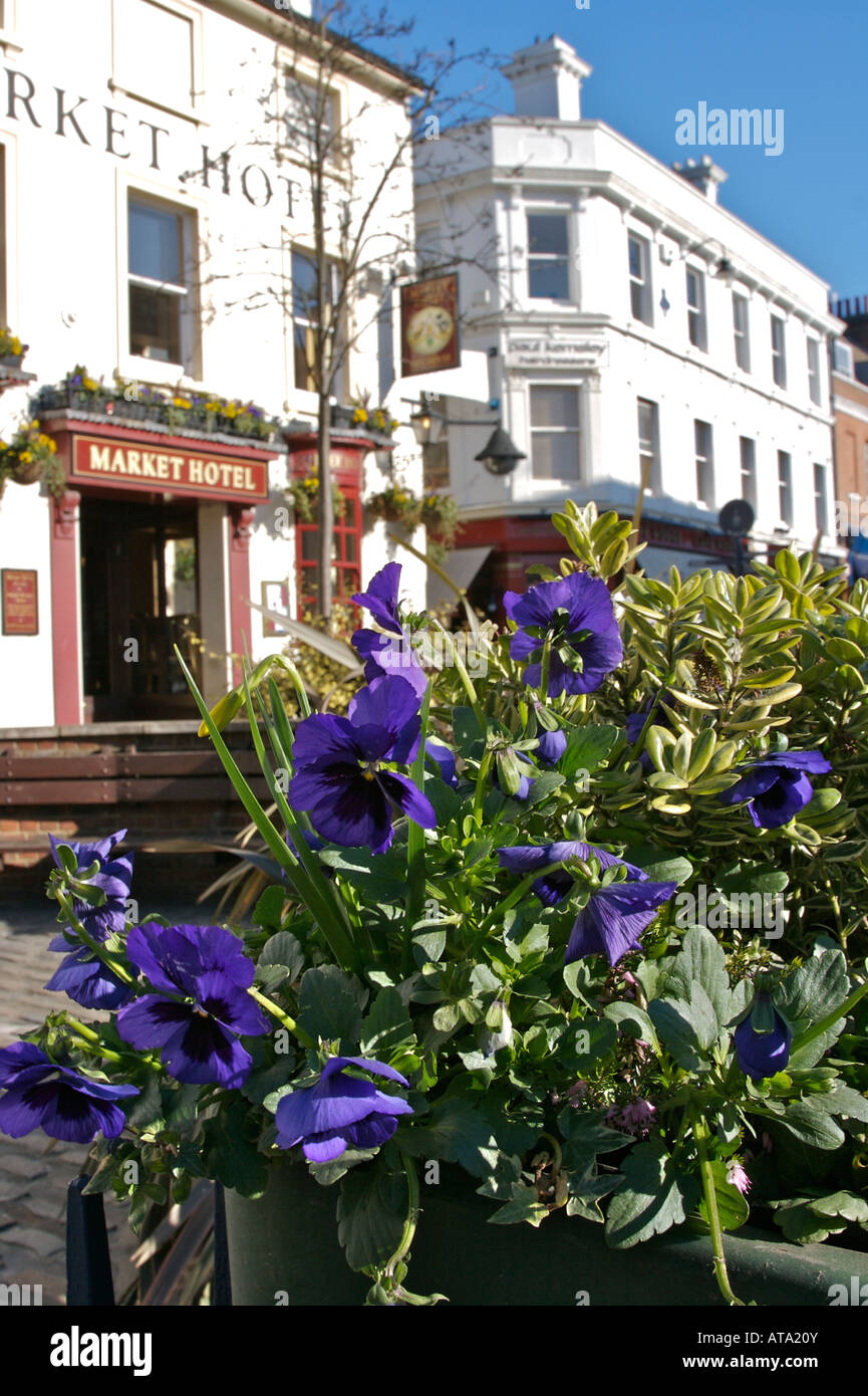 Reigate Town Centre Reigate Surrey and the Market Hotel with Flower Box of Pansies in the Foreground Stock Photo
