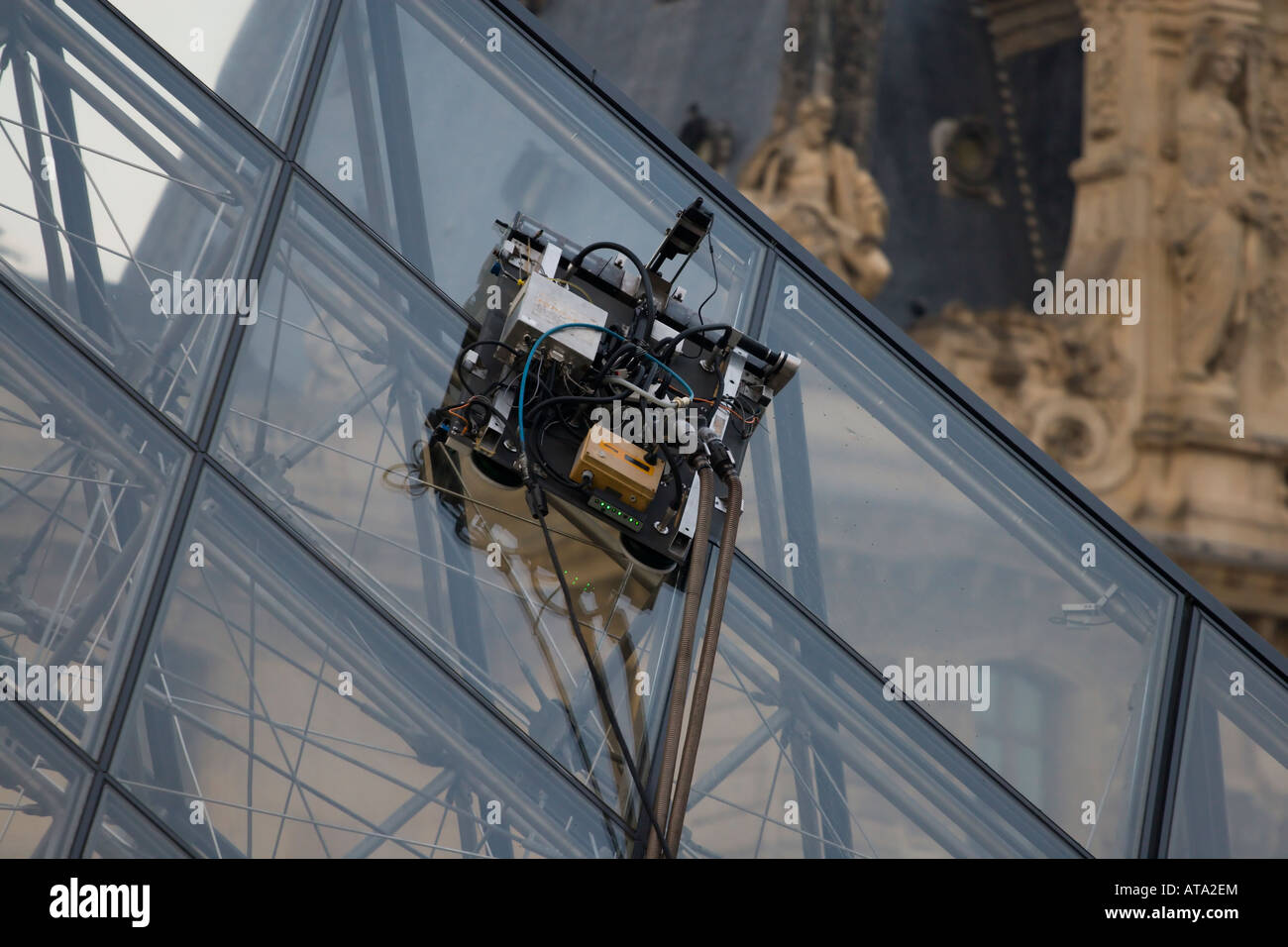 Window Cleaning machine at the Louvre Pyramid, Paris, France Stock Photo -  Alamy