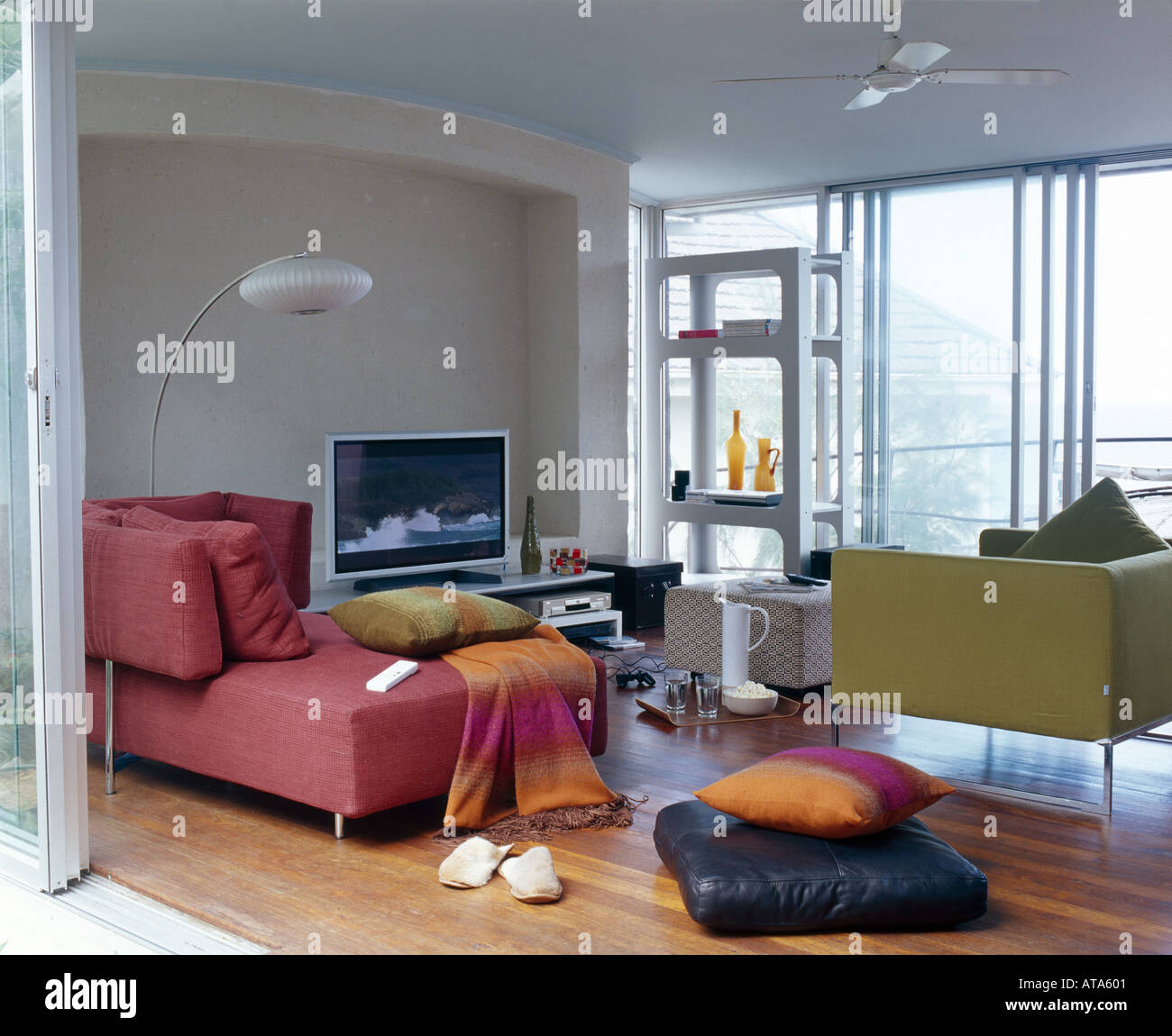 Modern sitting room with large sofas and flat screen TV Stock Photo Alamy