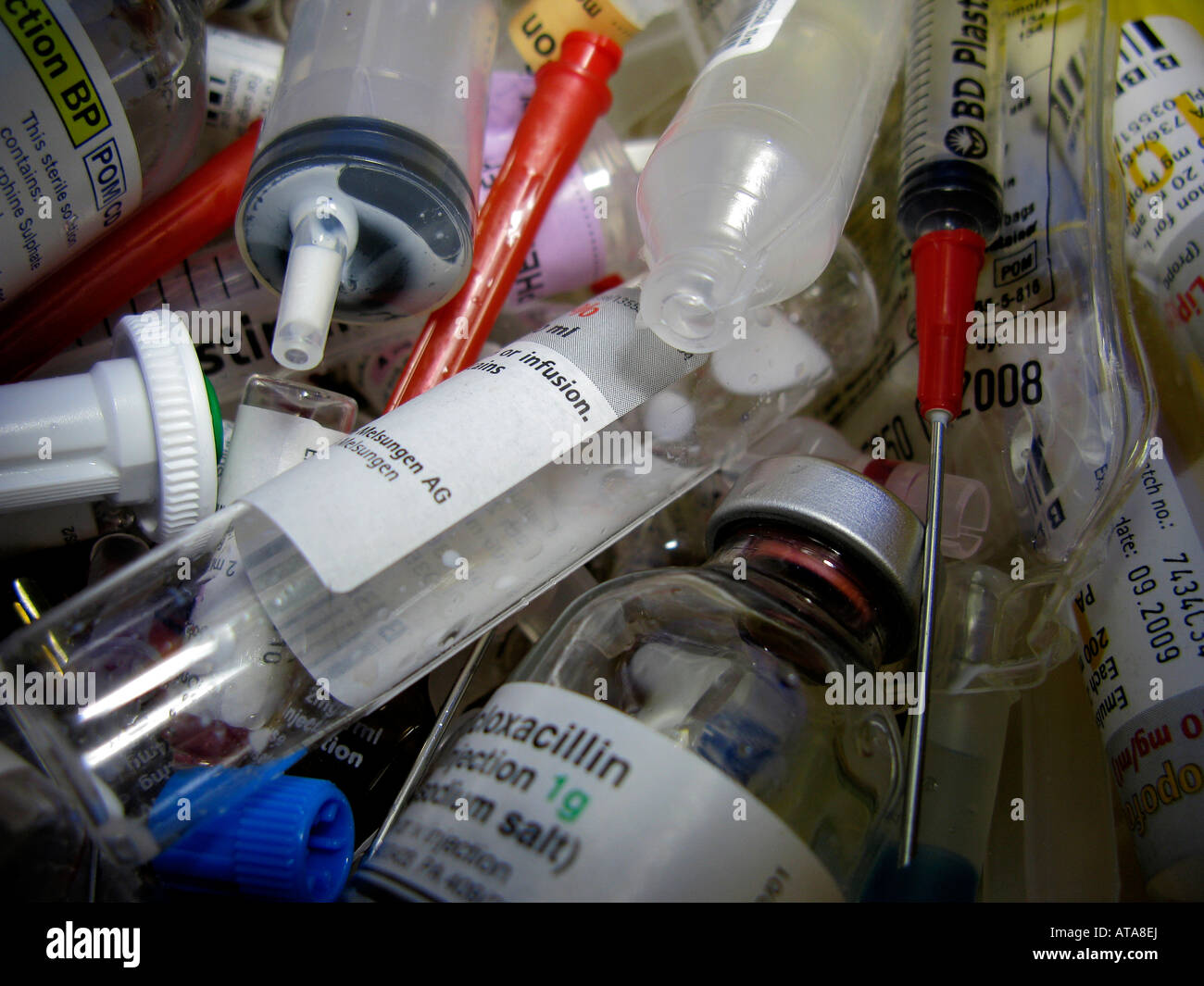 Contents of a sharps bin in a hospital Stock Photo Alamy