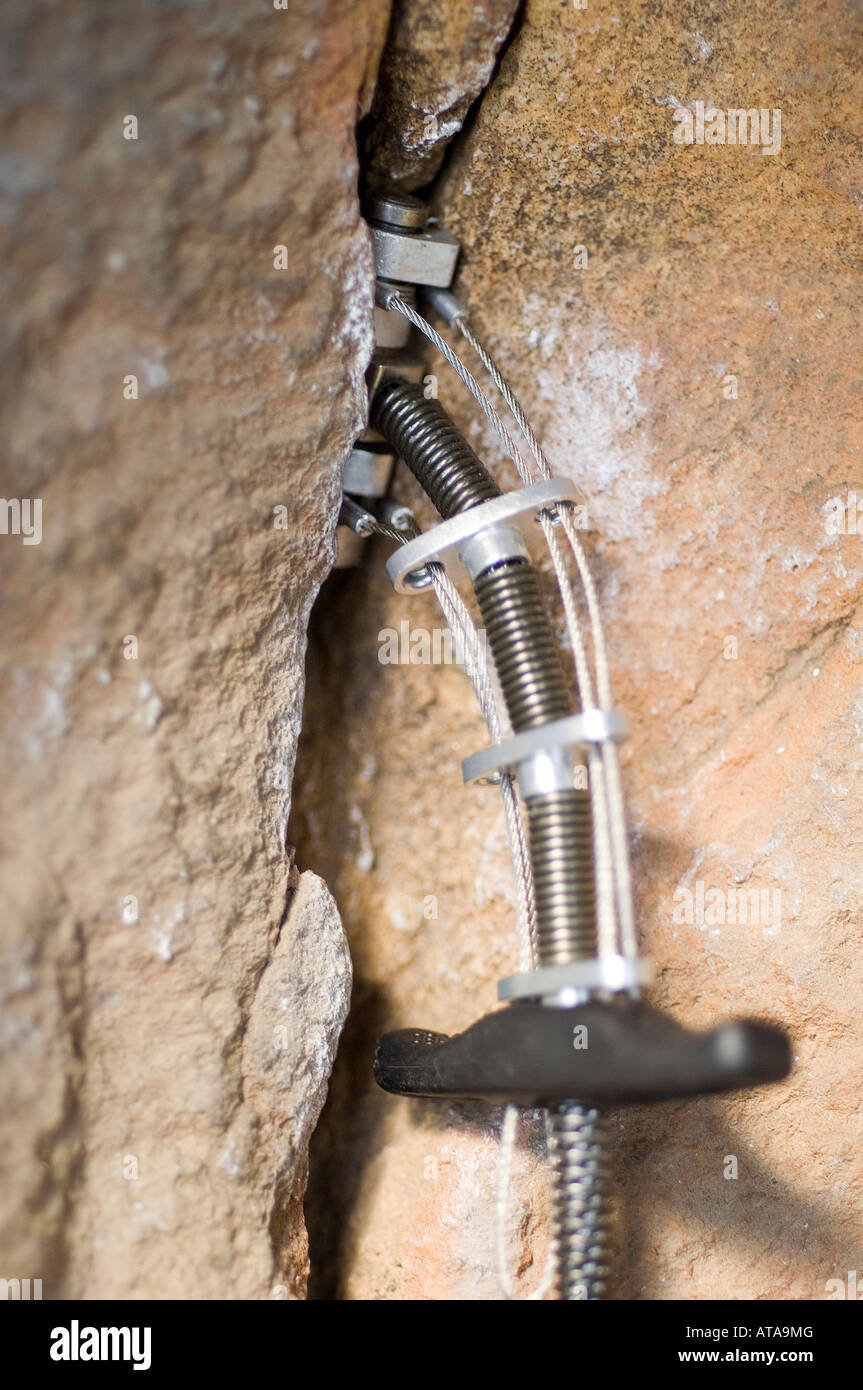 camming device in a crack used for rock climbing for protection during
