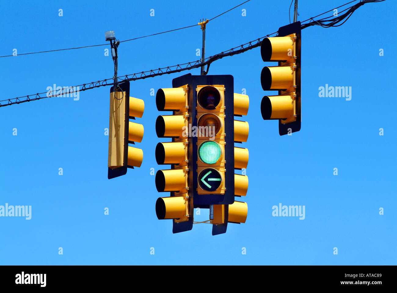 Yellow traffic lights signals with green light on Stock Photo Alamy