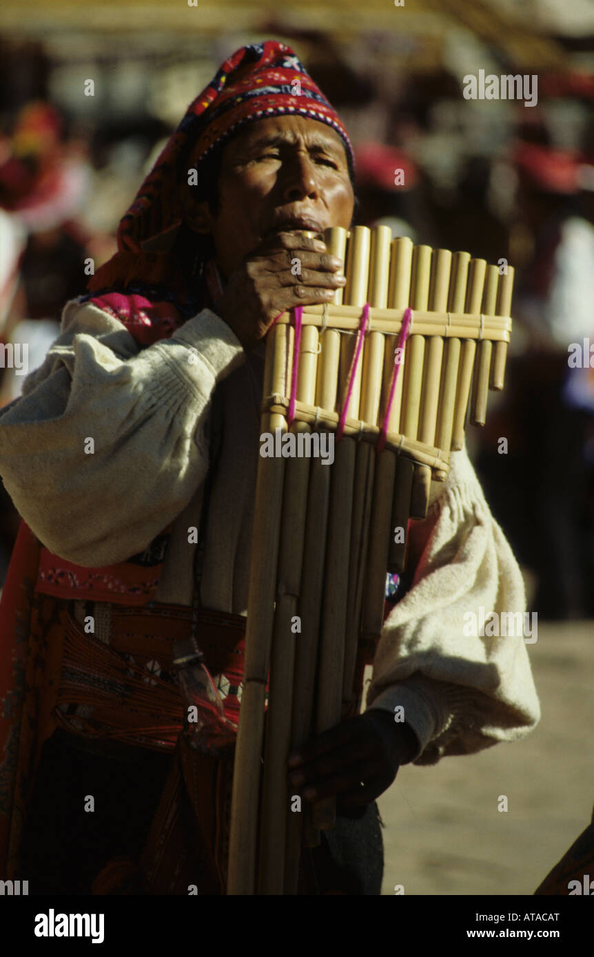 Native Quechua indian playing the panpipes in Cuzco, Peru Stock Photo Alamy