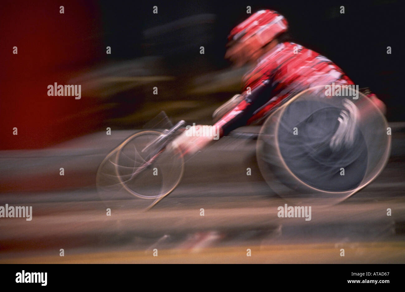 HANDICAPPED IN WHEELCHAIR RACING AGAINST TIME Stock Photo