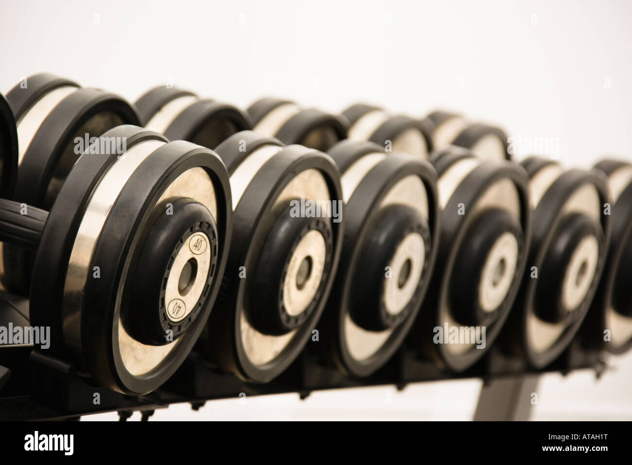 Hand weights on rack at gym Stock Photo Alamy