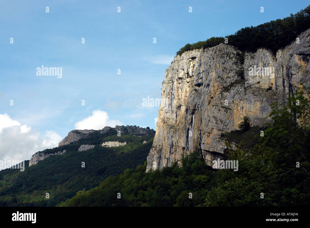 In France's Jura massif limestone cliffs are a common geological feature, this one above the Loue river valley Stock Photo
