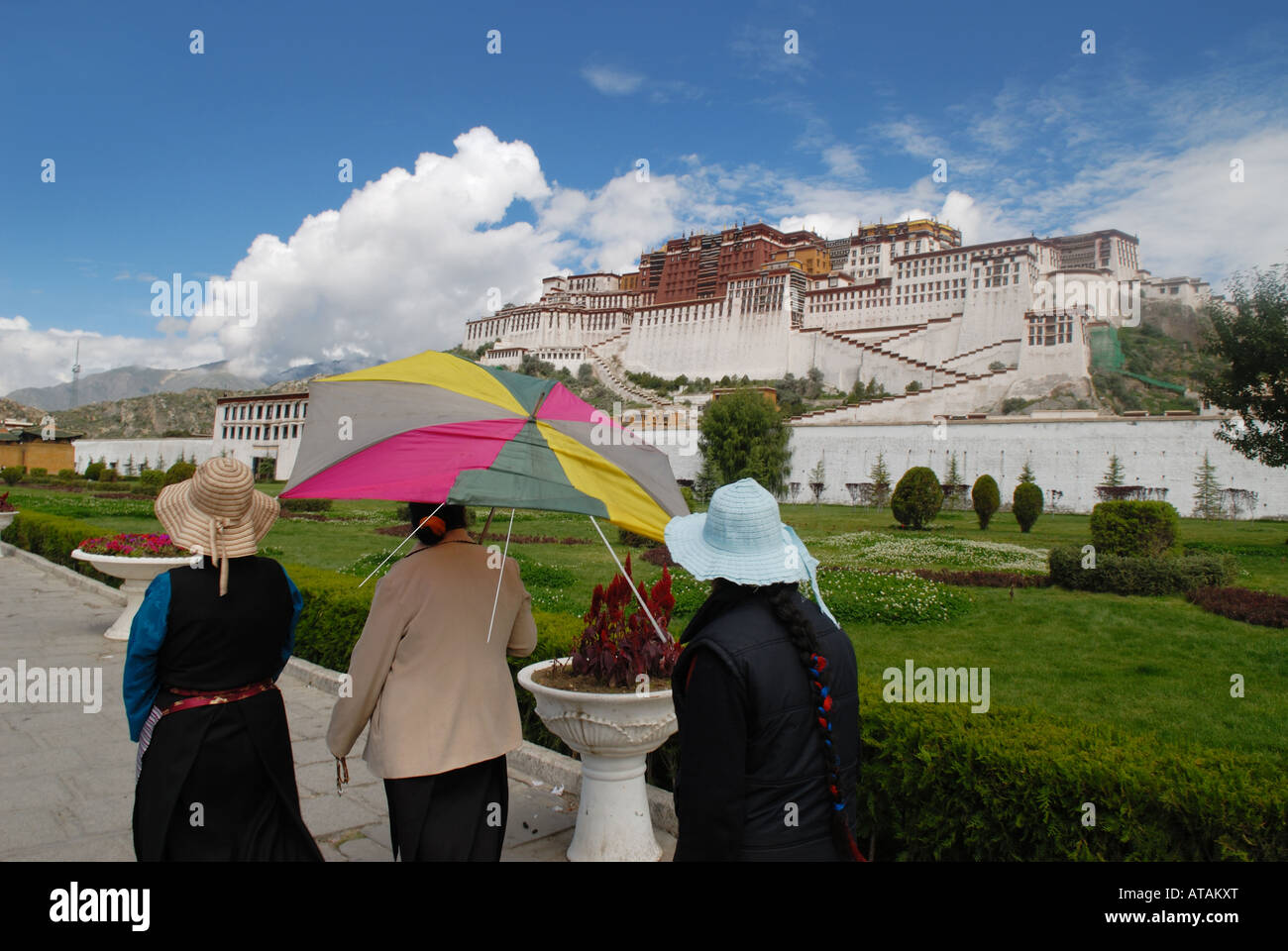 Pilgrim in front of the Potala Palace in Lhasa, Tibet Stock Photo